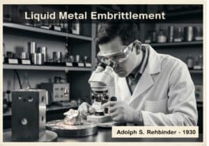 Materials scientist analyzing metal fracture due to liquid metal embrittlement in a laboratory.