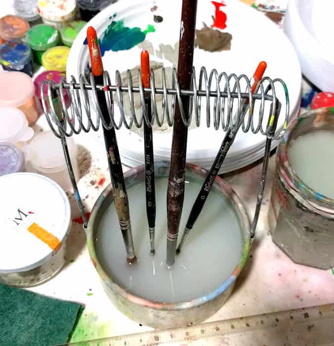 Brush holding spring