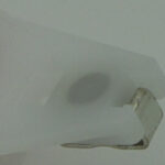 Metal insert over spring detail