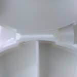 Sauce cap hinge front