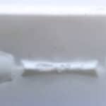 Sauce cap hinge side